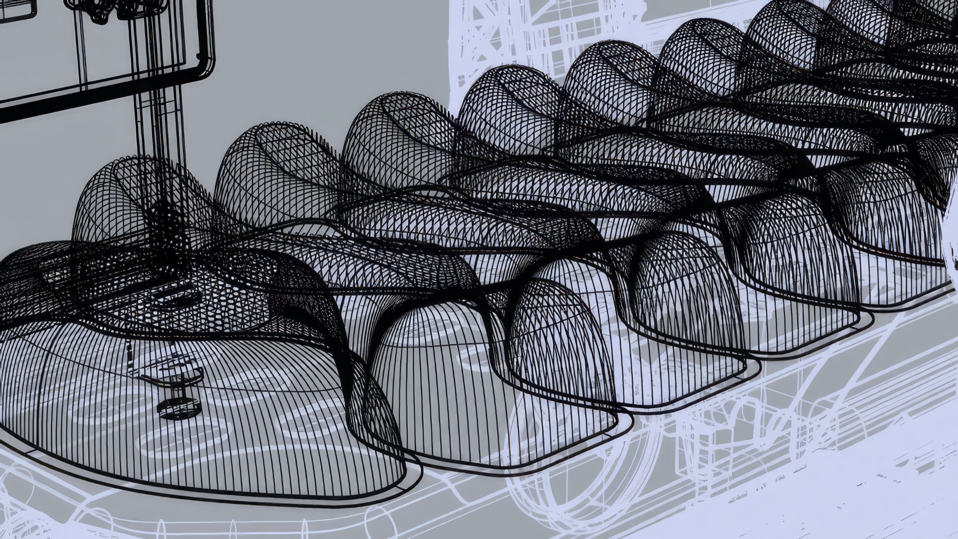 Wireframe render of a row of soft robotic cells, drawn in black over a pale lilac frame
